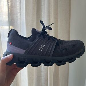 On Running Black Athletic Shoes with CloudTec Sole